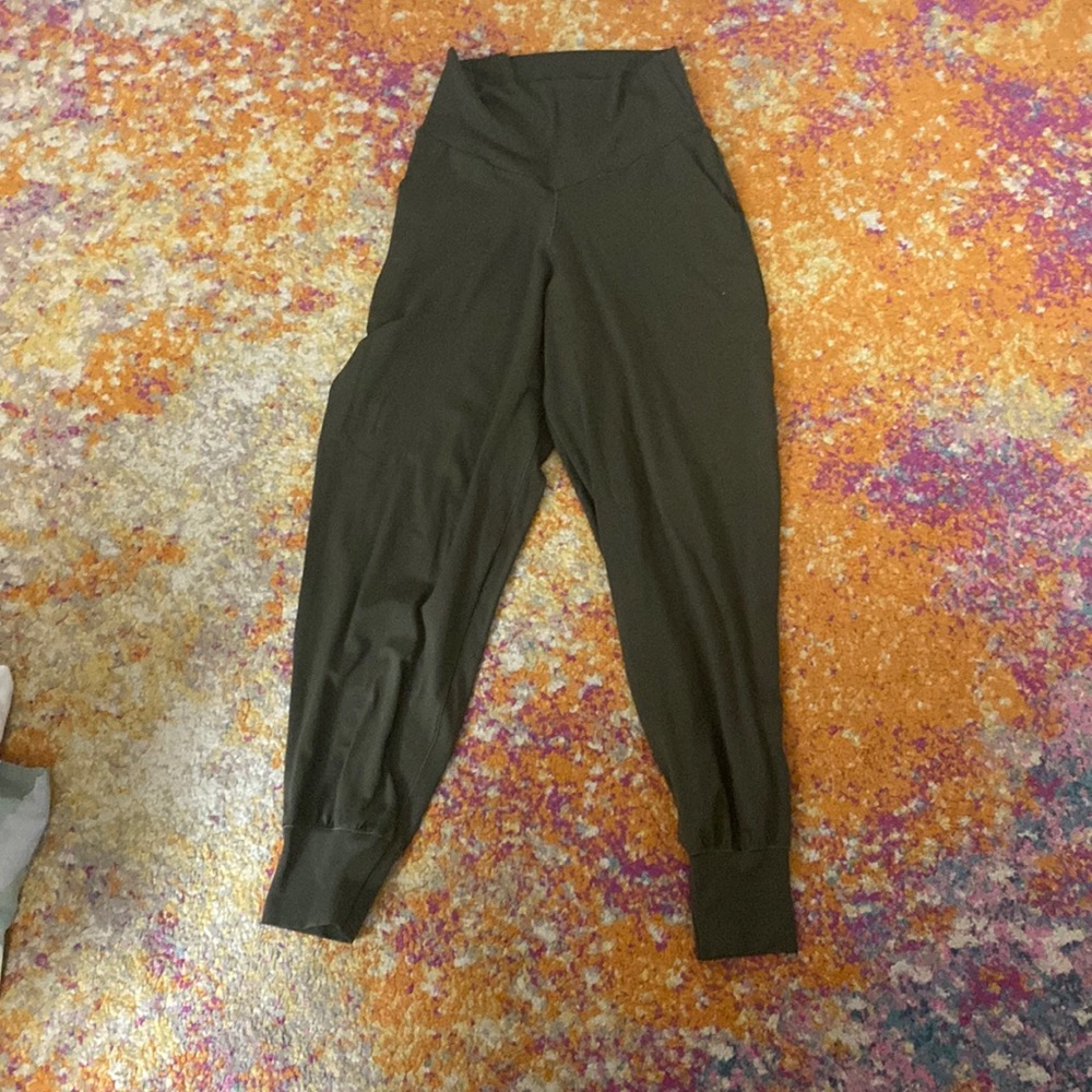 A woman’s pair of joggers green and comfortably soft to walk in